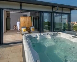 Apartma z jacuzzijem kot prednost za goste in lastnike nastanitev